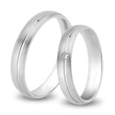 Pair of thin, satin-finished steel engagement rings in silver