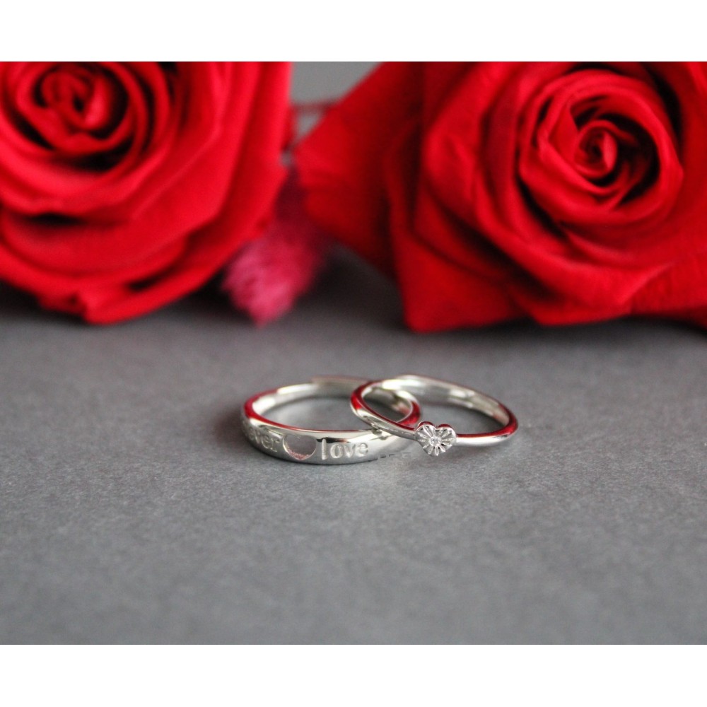 Couple of Adjustable Silver Rings for...