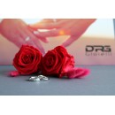 Couple of simple engagement rings made of steel with engraving