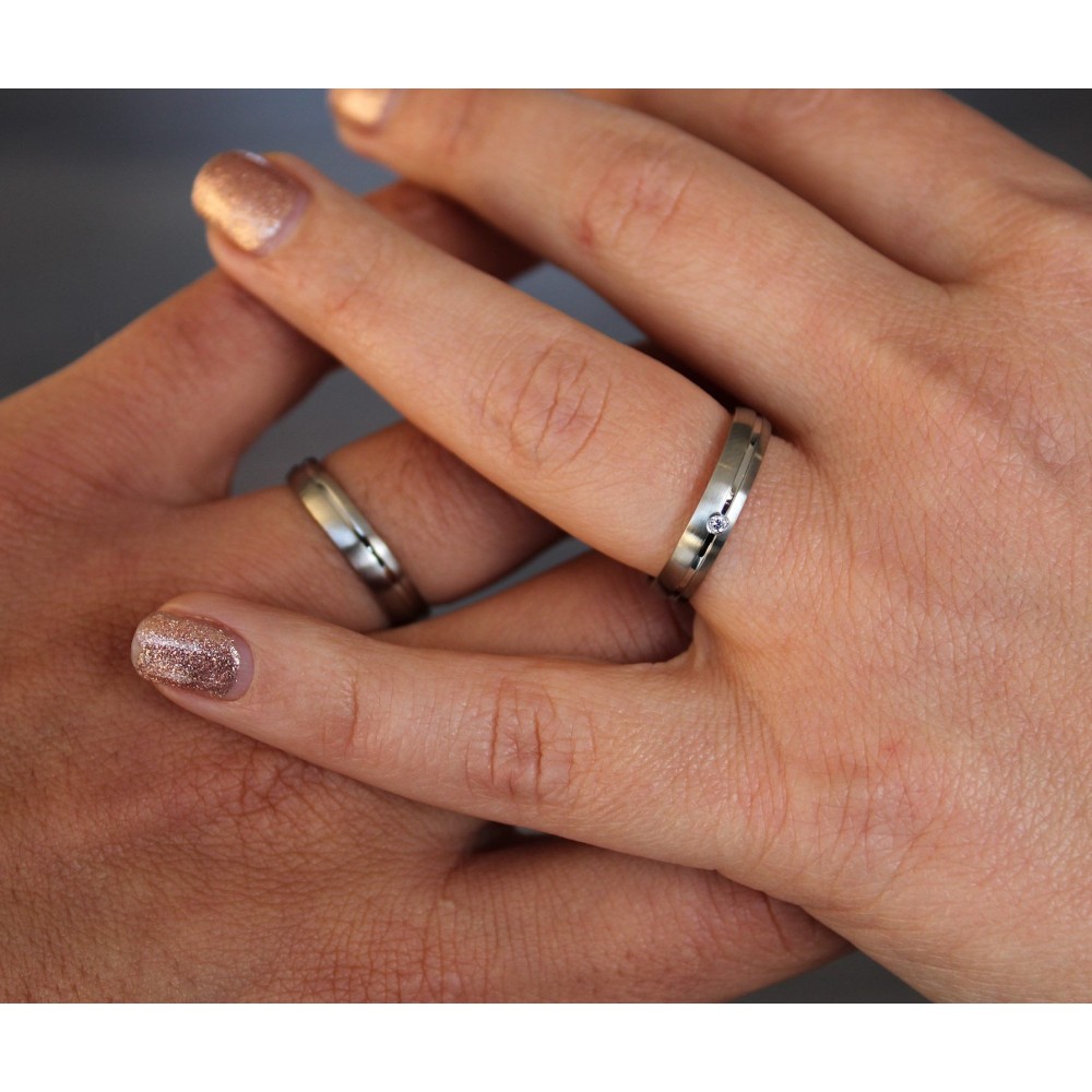 Pair of thin, satin-finished steel...