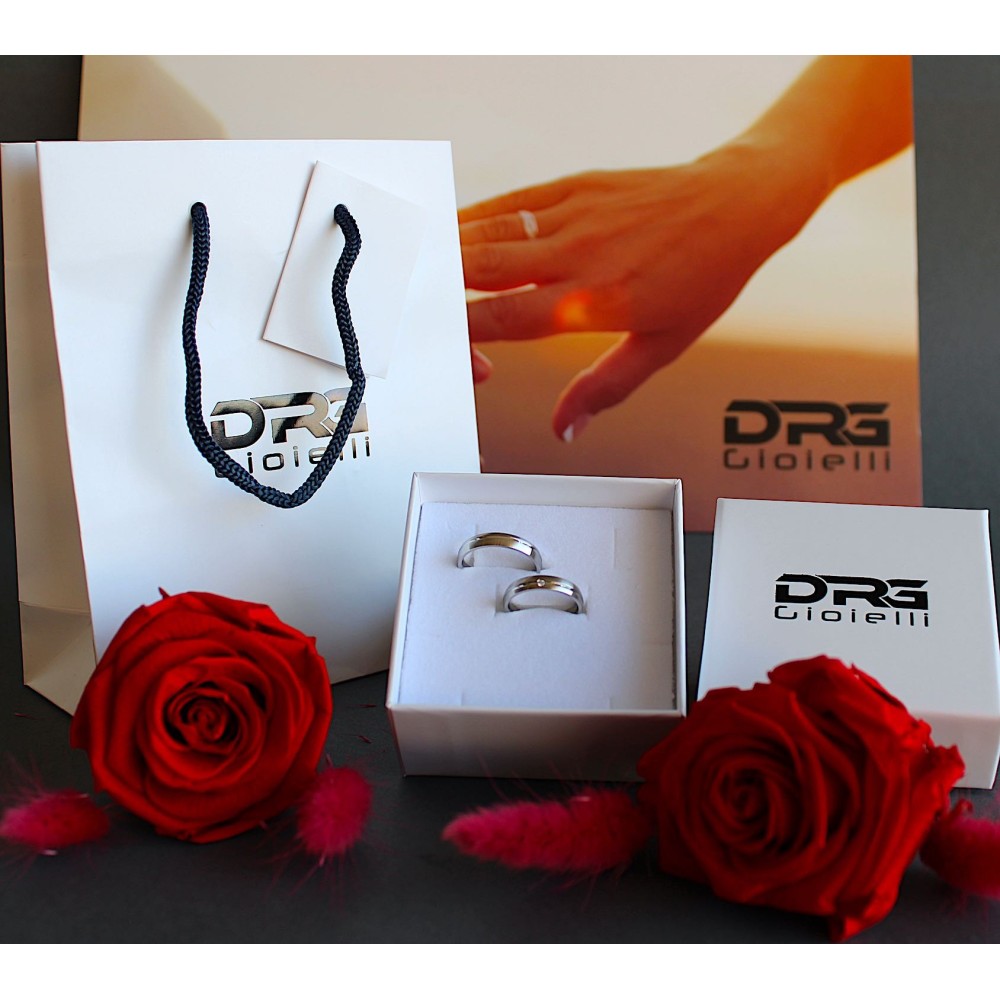 Pair of thin, satin-finished steel...