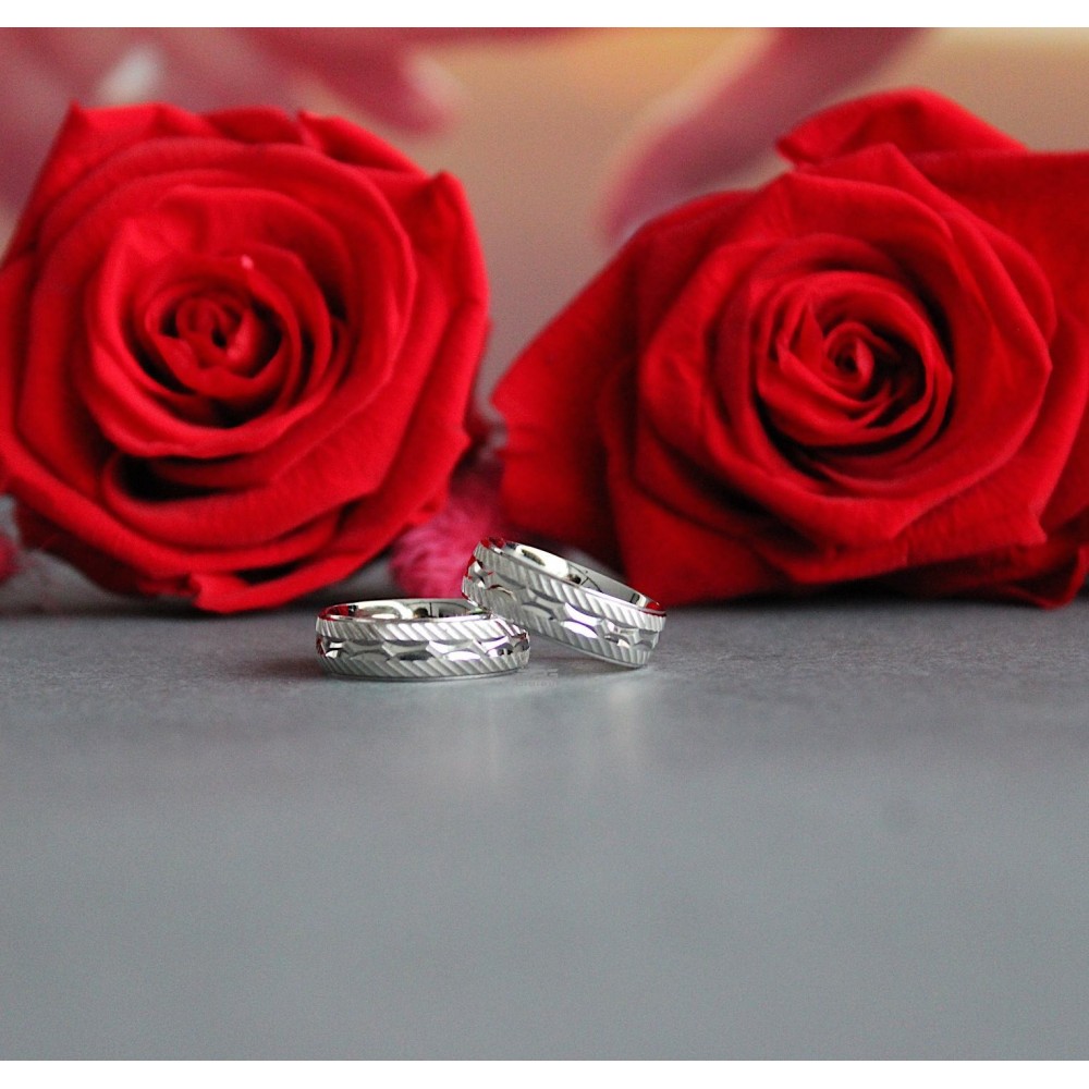 Couple of Engagement Rings in 925...