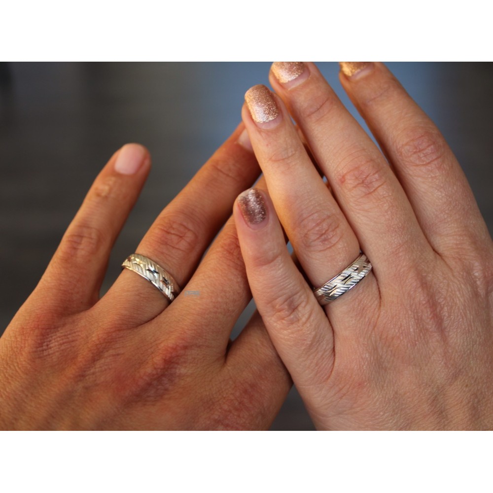 Couple of Engagement Rings in 925...