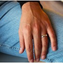 Pair of 5g simple 925% Silver wedding rings with engraving.