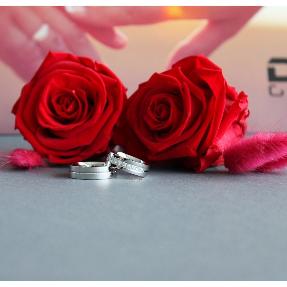 Pair of Steel Engagement Rings with...