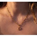 Gold choker in stainless steel for women with staple chain and special closure.