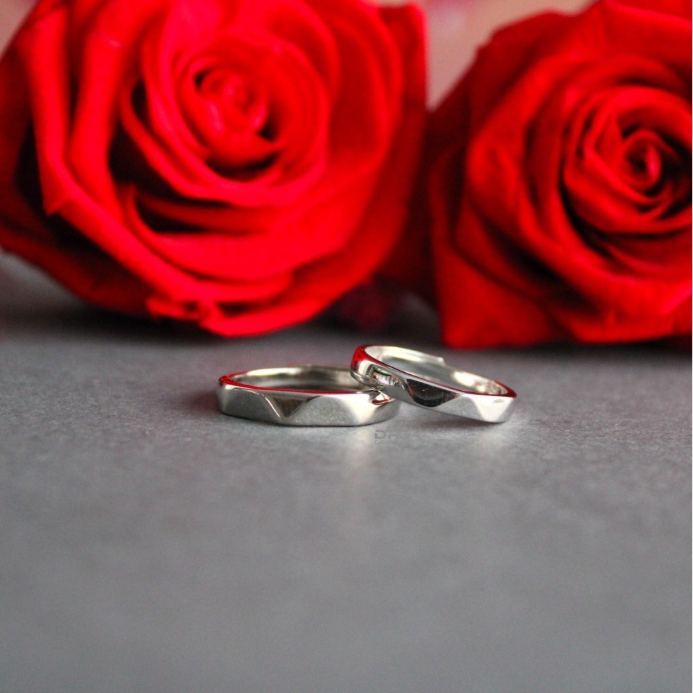 Couple of 925% Silver Engagement Rings