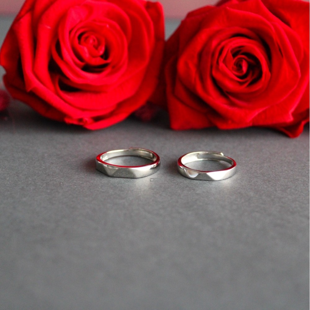 Couple of 925% Silver Engagement Rings