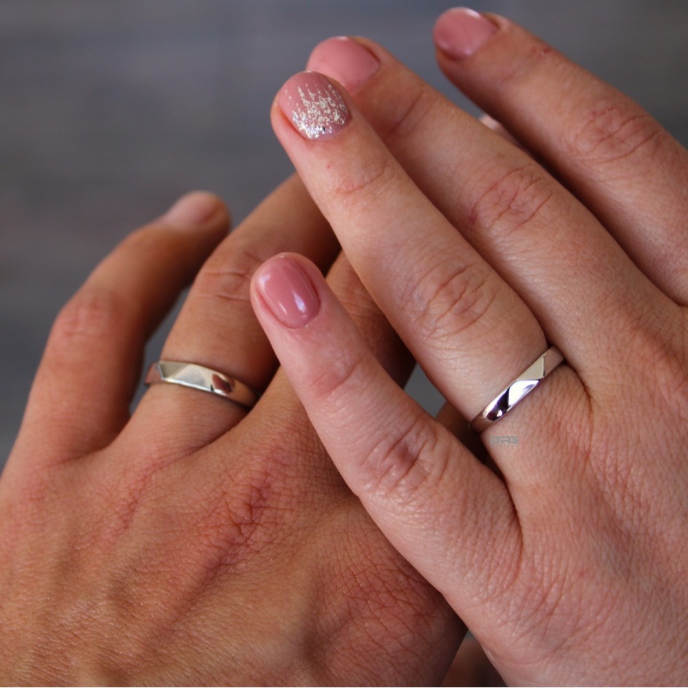 Couple of 925% Silver Engagement Rings