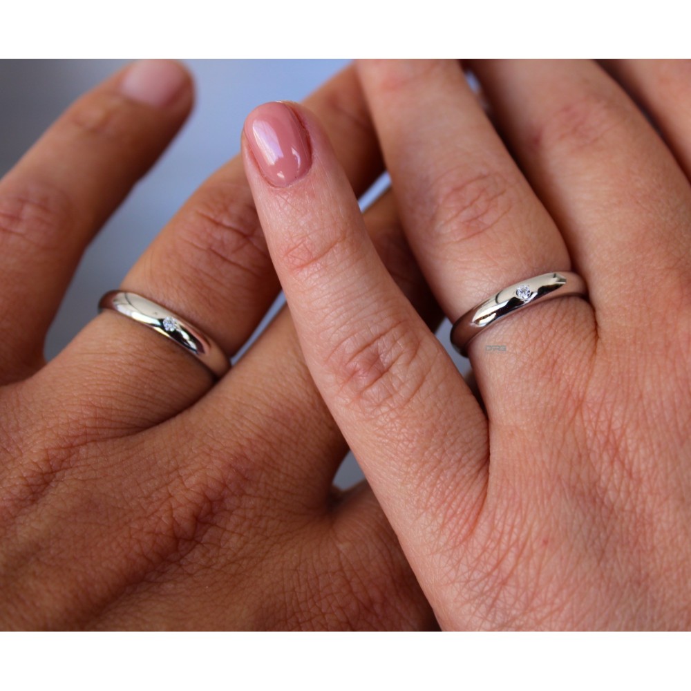 Pair of 925 Silver Wedding Rings with...