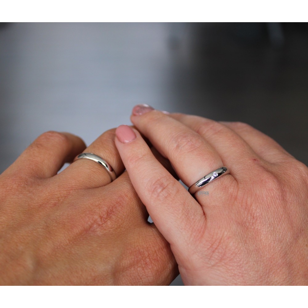 Pair of 925 Silver Wedding Rings with...