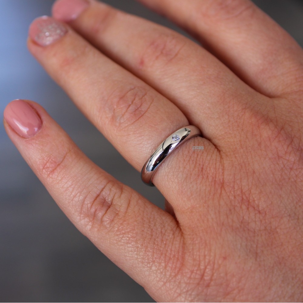 Pair of 925 Silver Wedding Rings with...