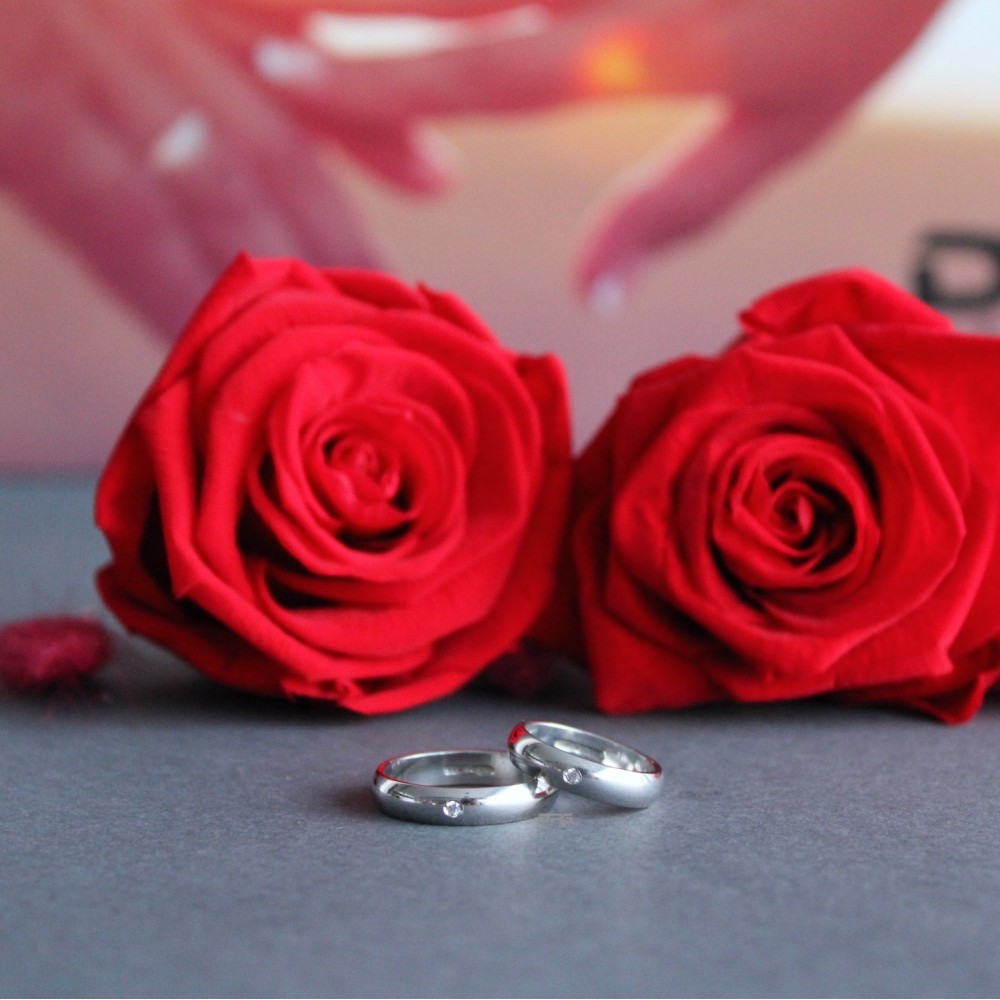 Pair of 925 Silver Wedding Rings with...