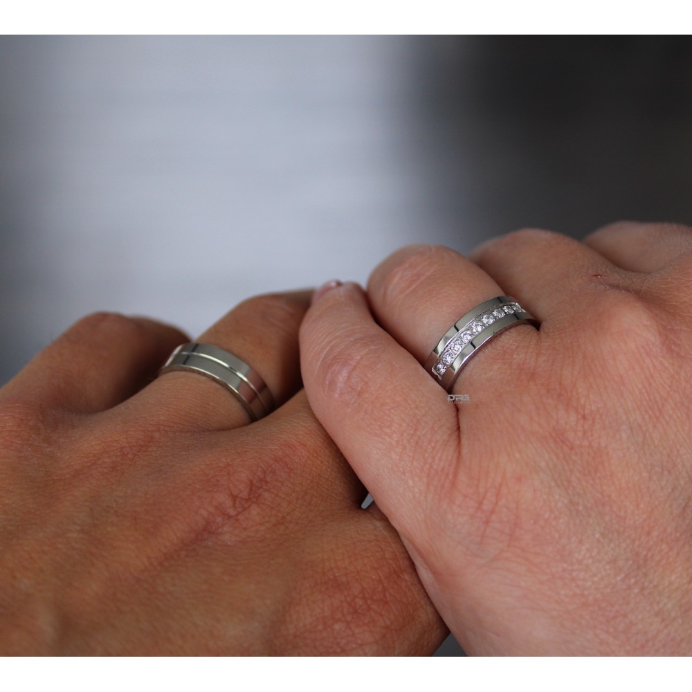 Pair of Steel Engagement Rings with...