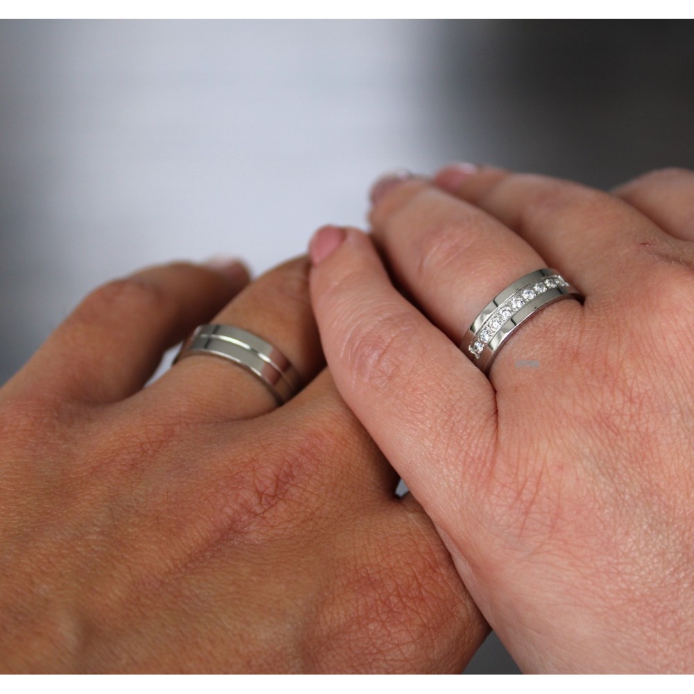 Pair of Steel Engagement Rings with...