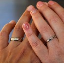 Couple of simple engagement rings made of steel with engraving