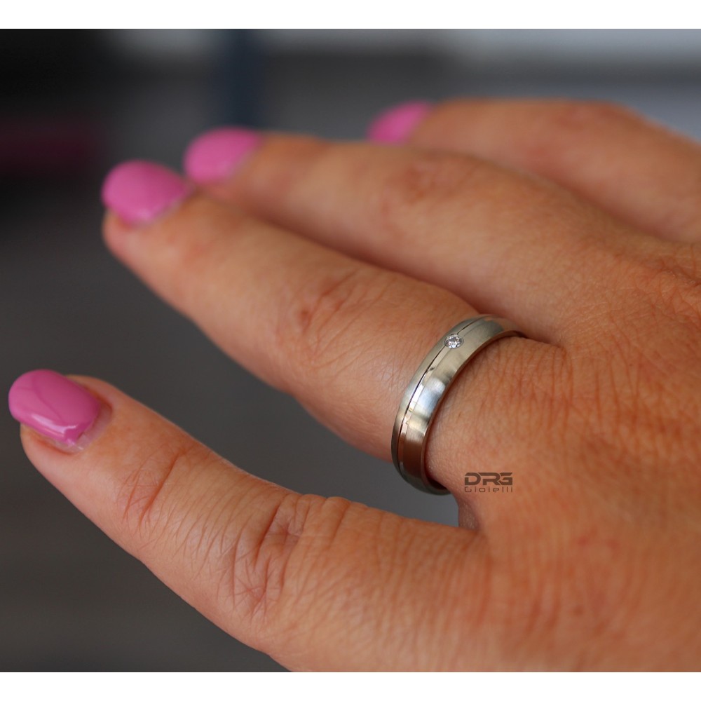 Pair of thin, satin-finished steel...