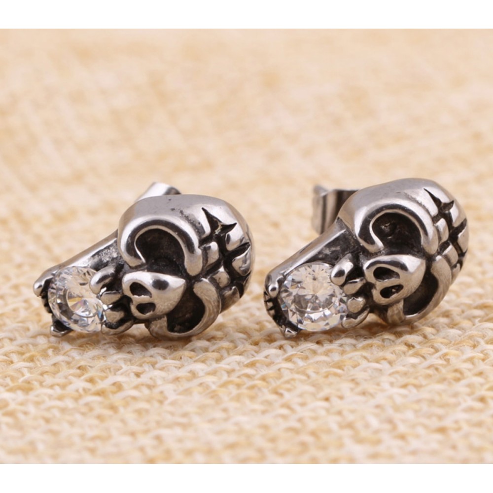 Unisex skull-shaped steel earrings