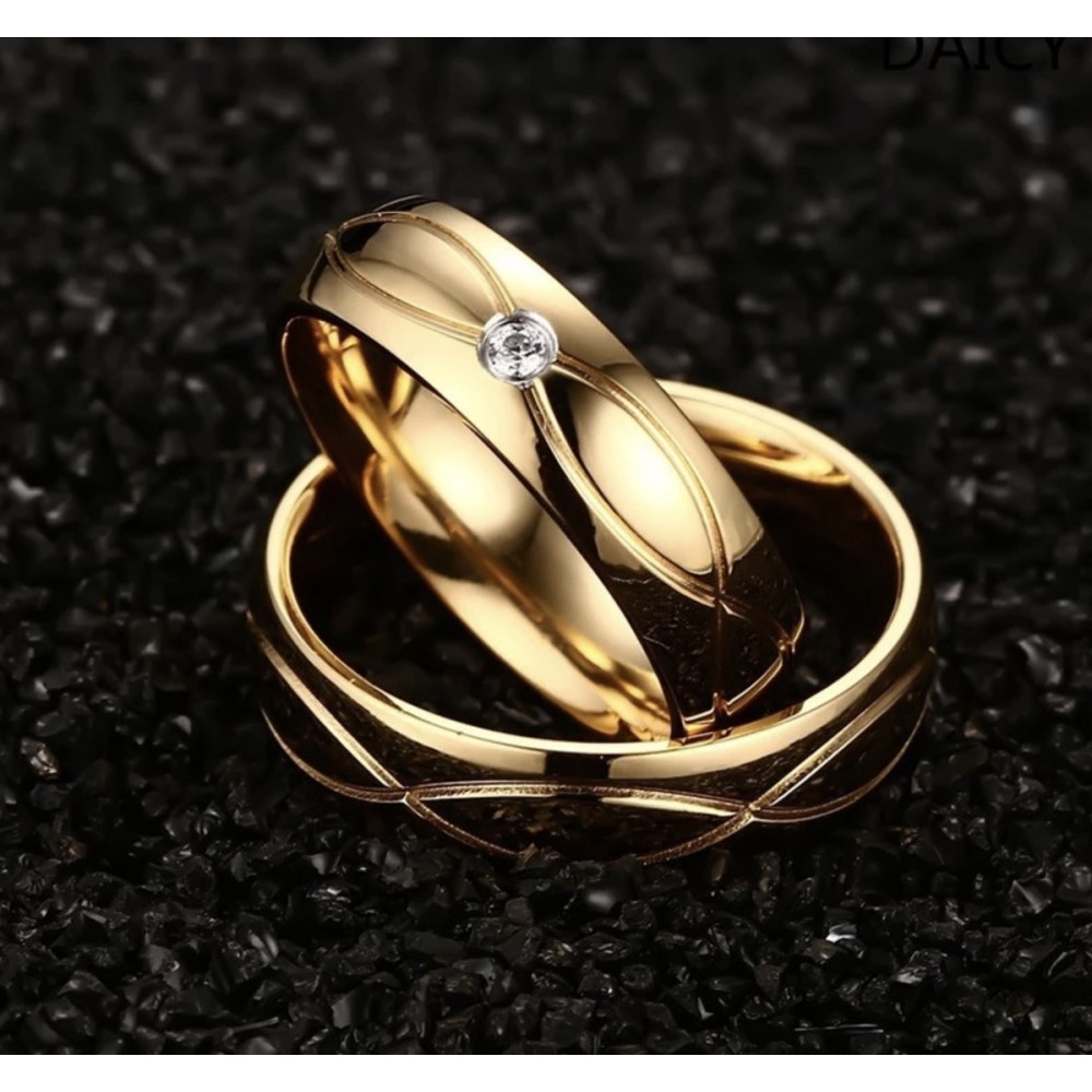 Steel and Gold Engagement Rings with...