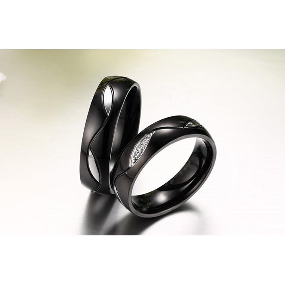 Pair of engagement rings in black steel
