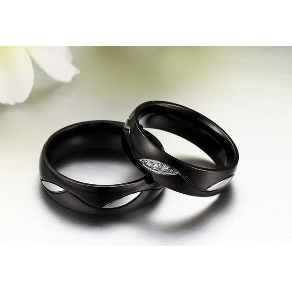 Pair of engagement rings in black steel
