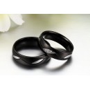 Pair of engagement rings in black steel