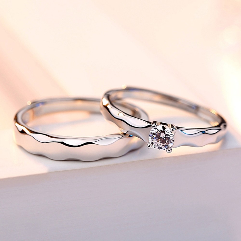 Couple of Adjustable Silver Rings for...