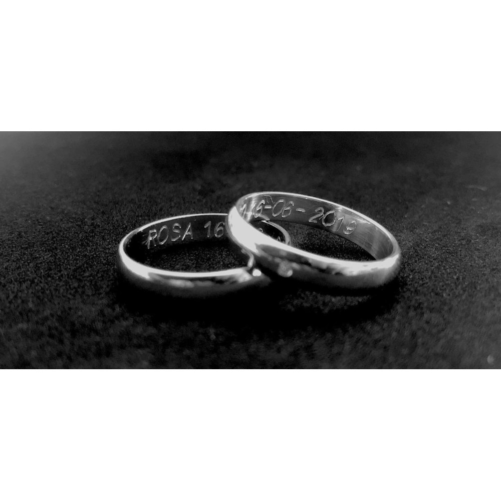 Pair of 925 Silver Wedding Rings with...