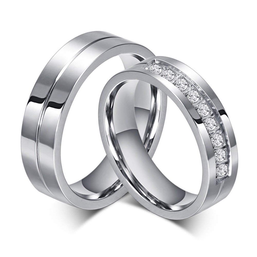 Pair of Steel Engagement Rings with...