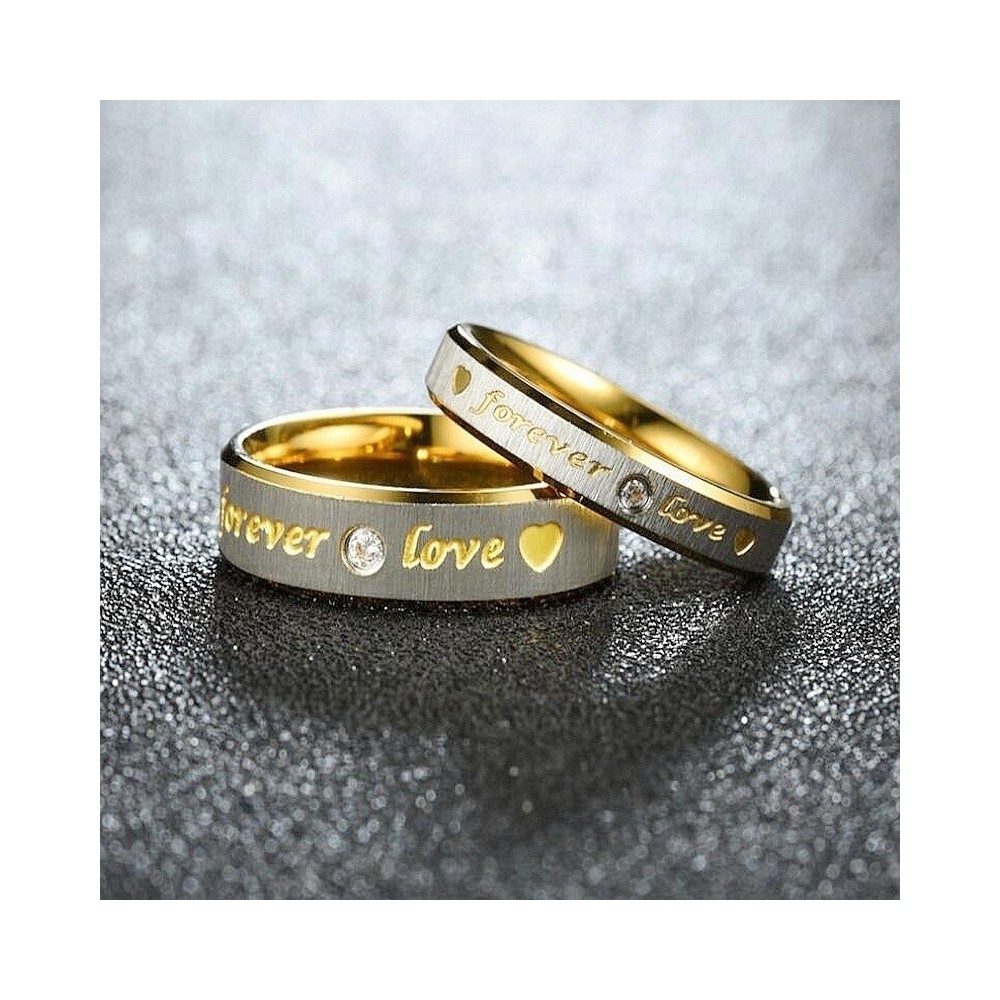 Couple of steel rings with zirconia...