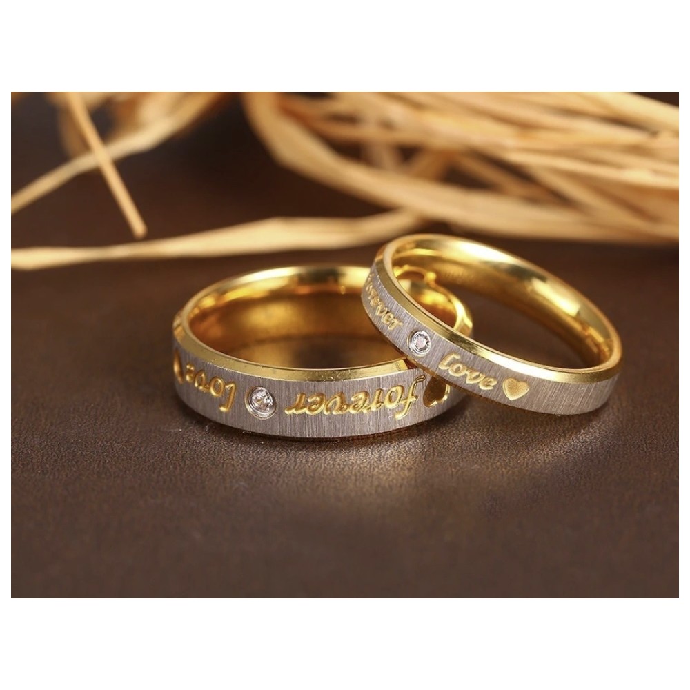 Couple of steel rings with zirconia...