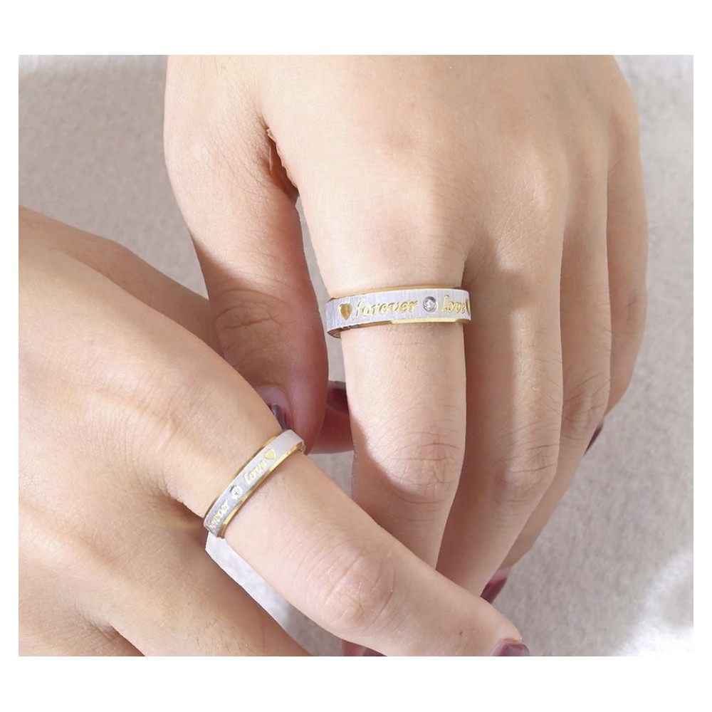 Couple of steel rings with zirconia...