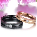 Couple of simple rose gold and black rings with small diamonds