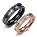 Couple of simple rose gold and black rings with small diamonds